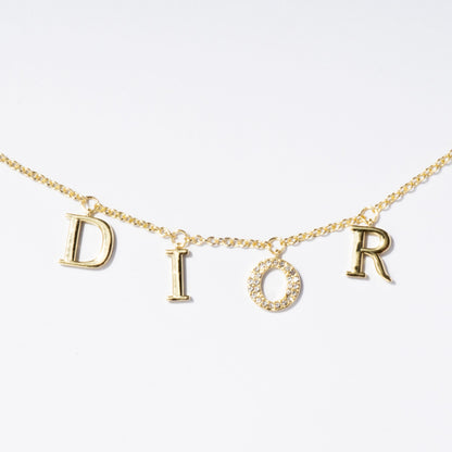 Exclusive Gold DR Necklace